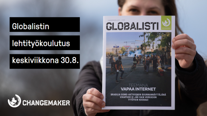 Nainen pitää kädessään Globalisti-lehteä.